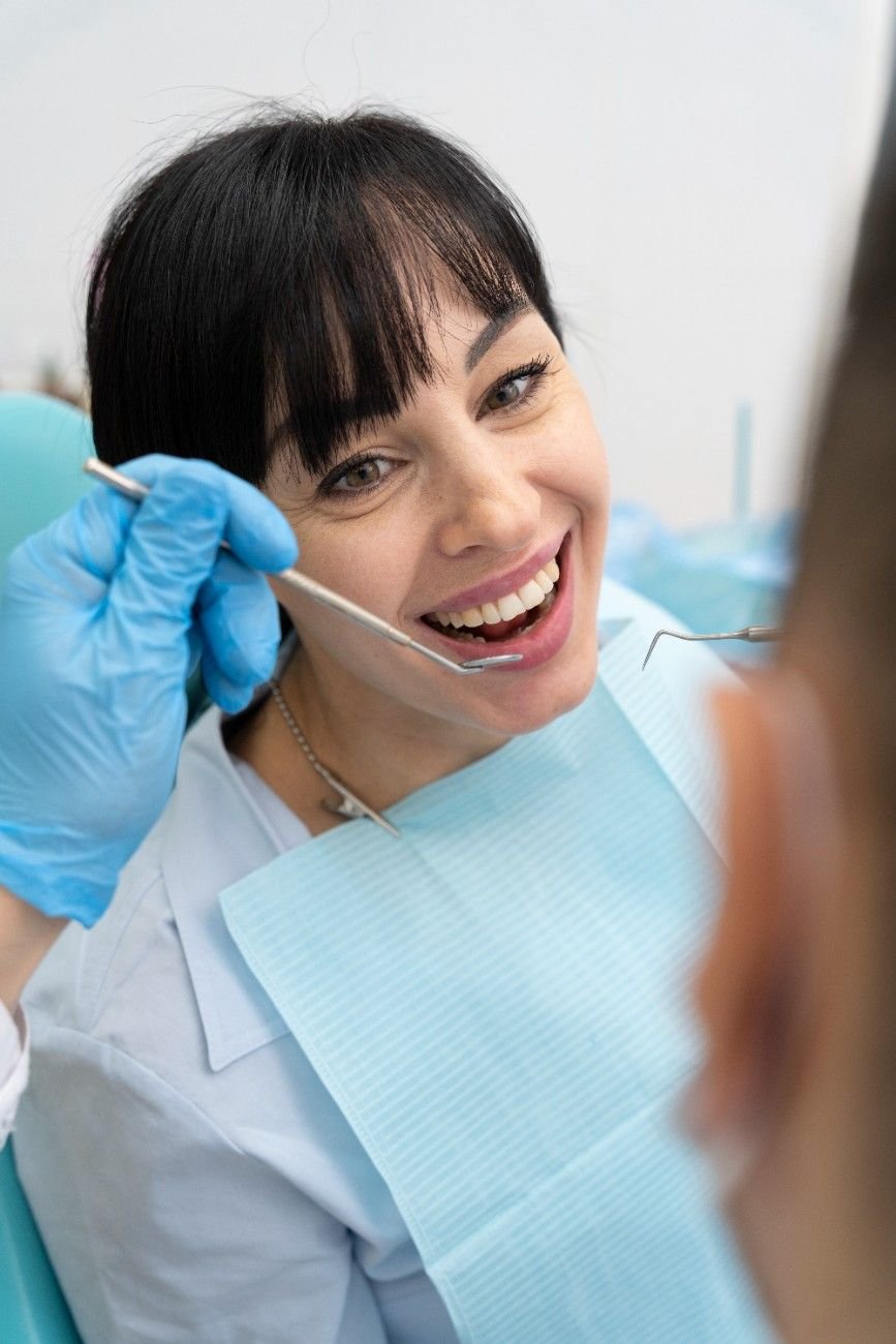 https://allstarsdental.com/wp-content/uploads/2025/10/dentist-doing-check-up-patient-1.jpg