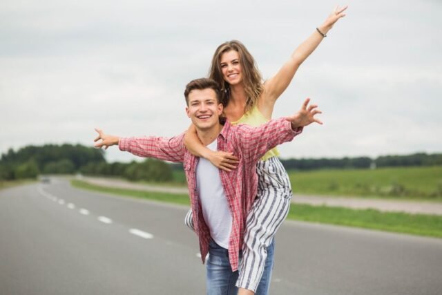https://allstarsdental.com/wp-content/uploads/2025/12/young-man-taking-his-girlfriend-piggyback-ride-countryside-road-1-640x427.jpg